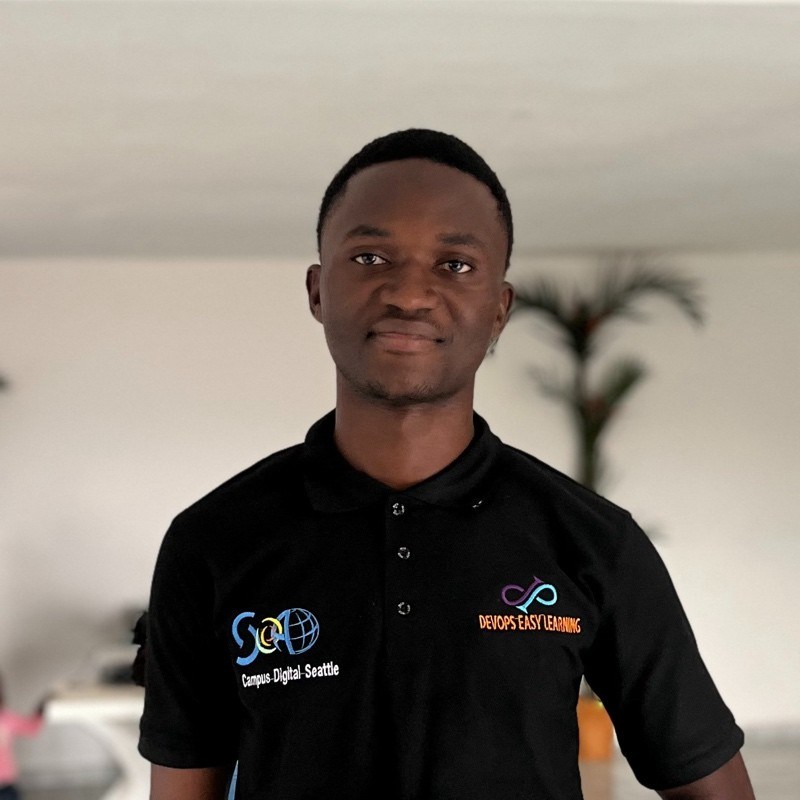 Portrait of Dexter NJIE Jr, General Manager of Aurora Social Cloud Solutions